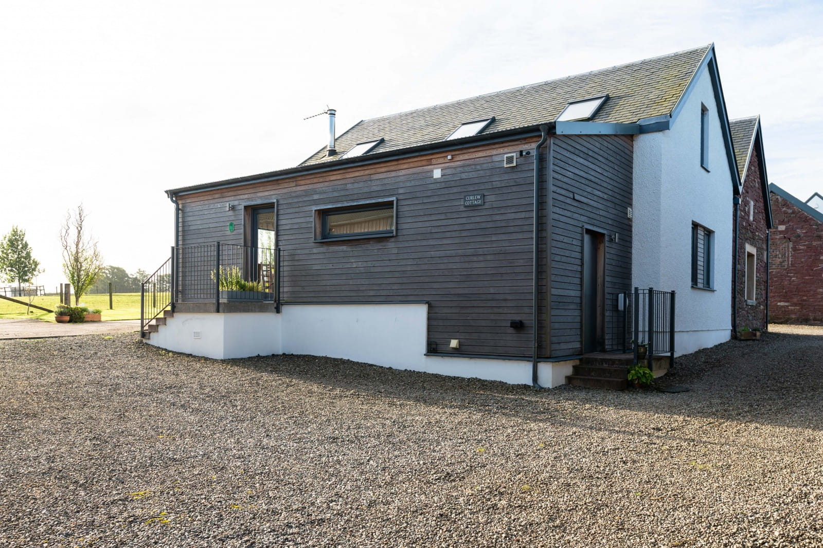 LArch clad kitchen & dining area